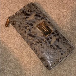 Full sized Michael Kors snake skinned wallet